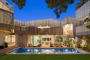 contemporary sculptural home with pool