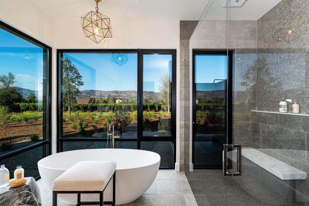 soaking tub with vineyard views