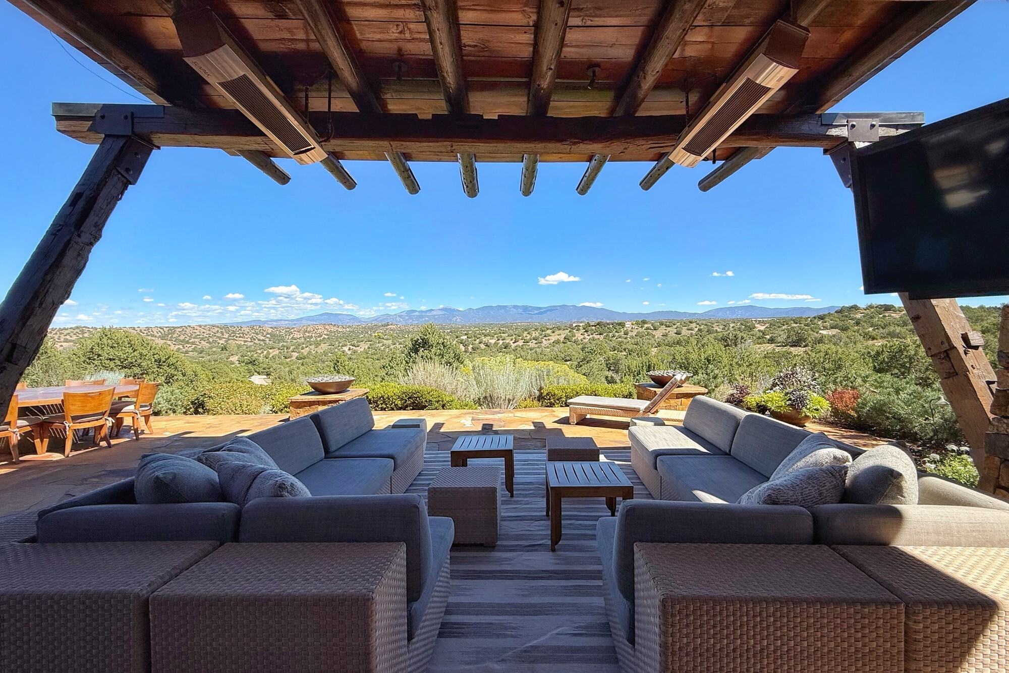 patio that opens up to views of mountains