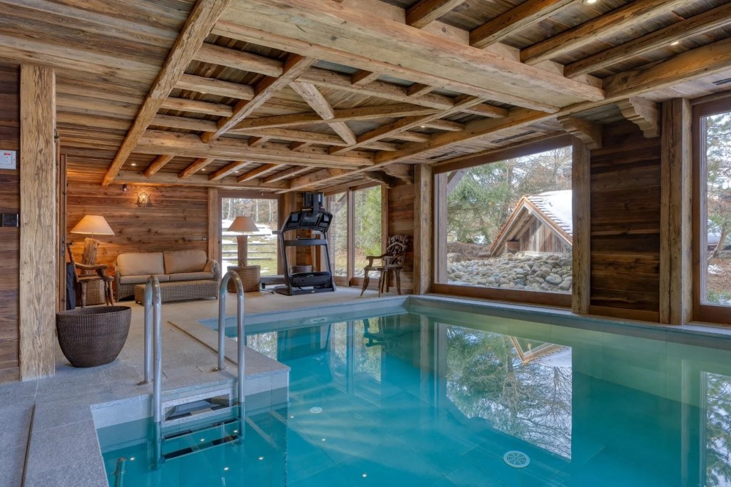 indoor pool in wooden cabin