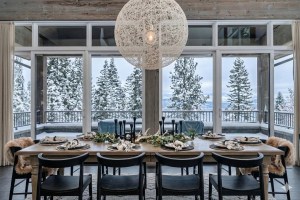 dining room with snowy views from large windows