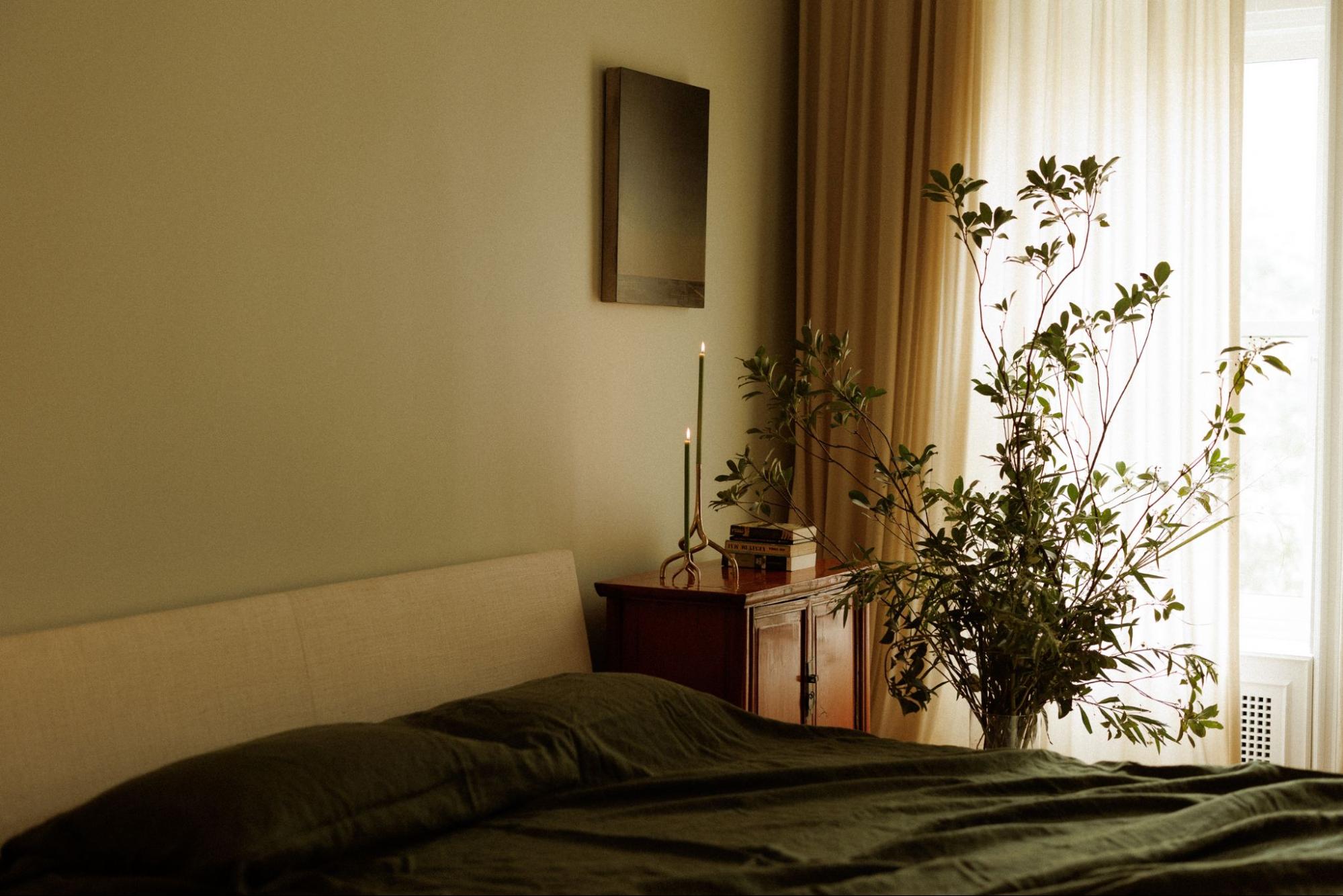 Ramona Albert’s Ramus candleholder subtly lights a bedroom. Photograph: Olivia Steuer
