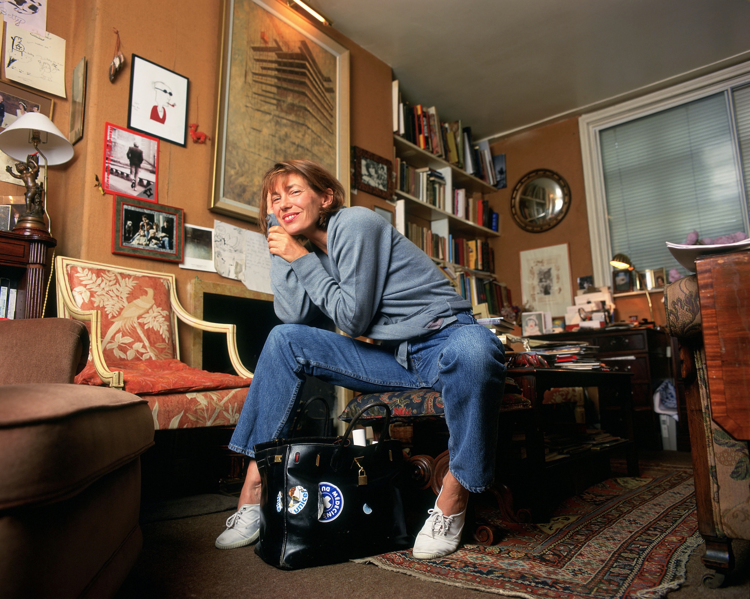 Jane Birkin with her archetypal Hermes Birkin successful her home