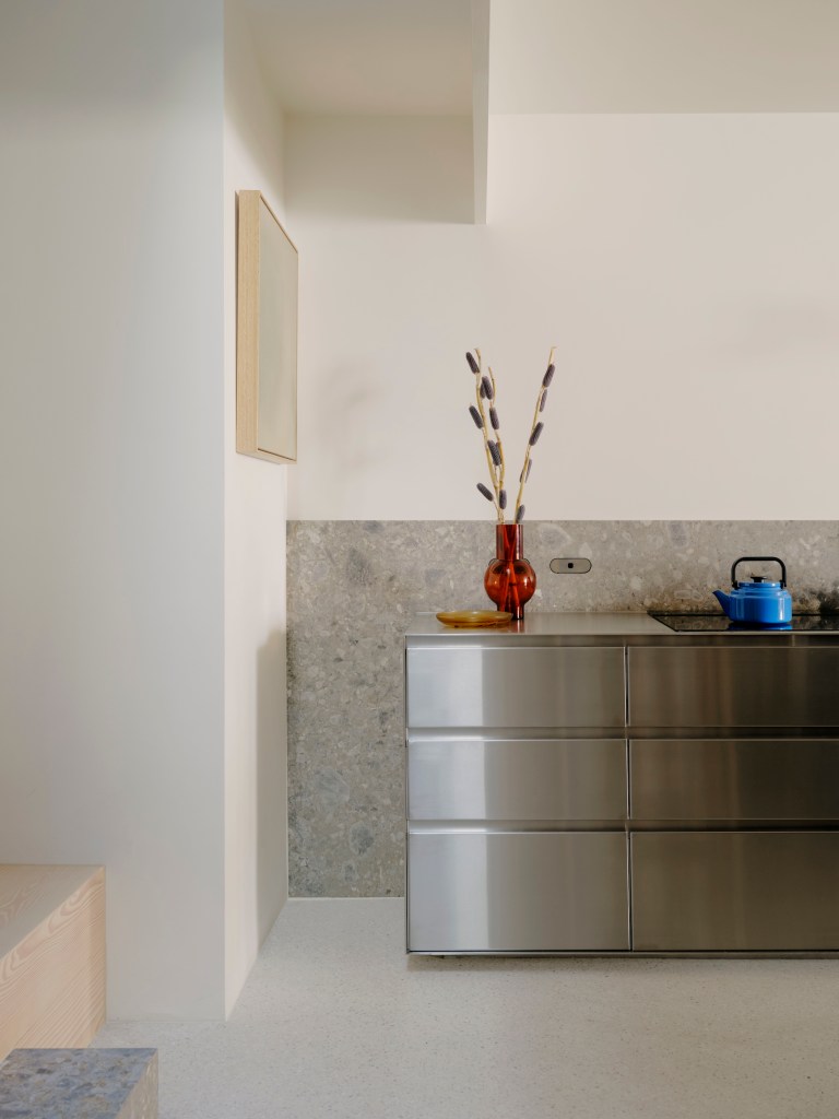 kitchen with stainless steel counters and drawers