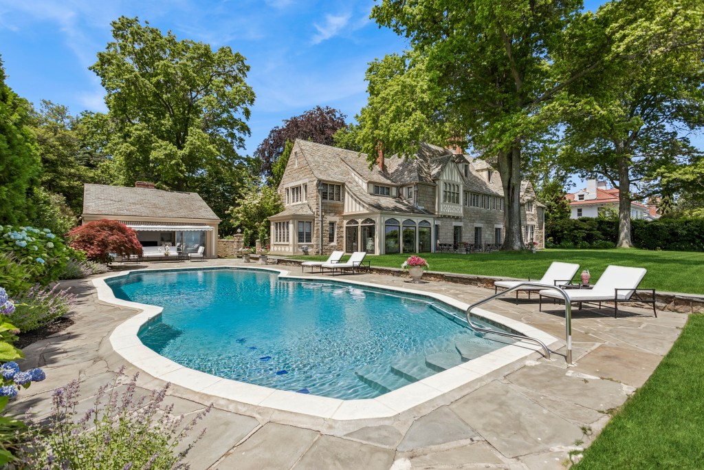 Home, swimming pool, and pool house in Westport, New York