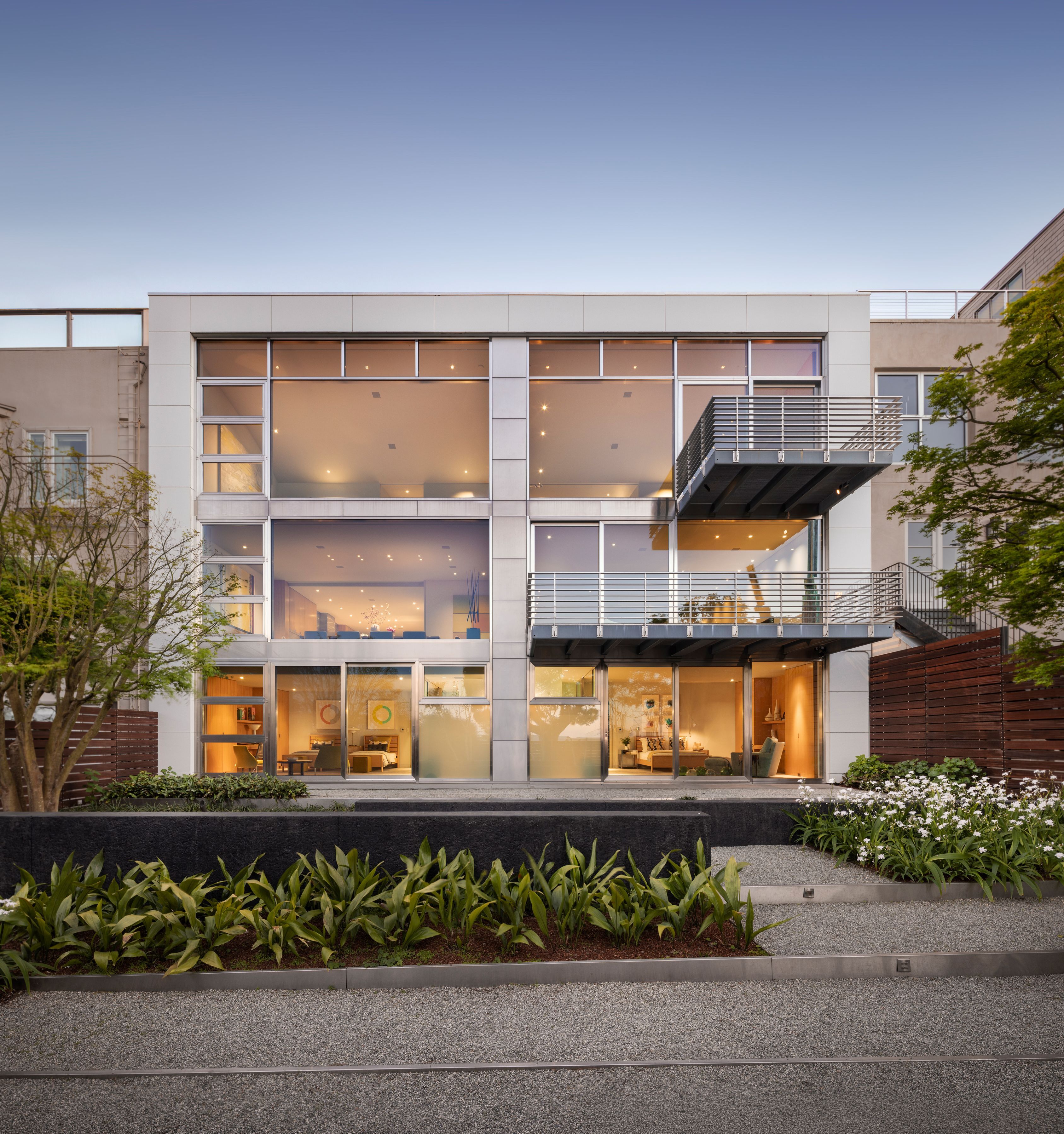exterior of modernist home, with extensive windows