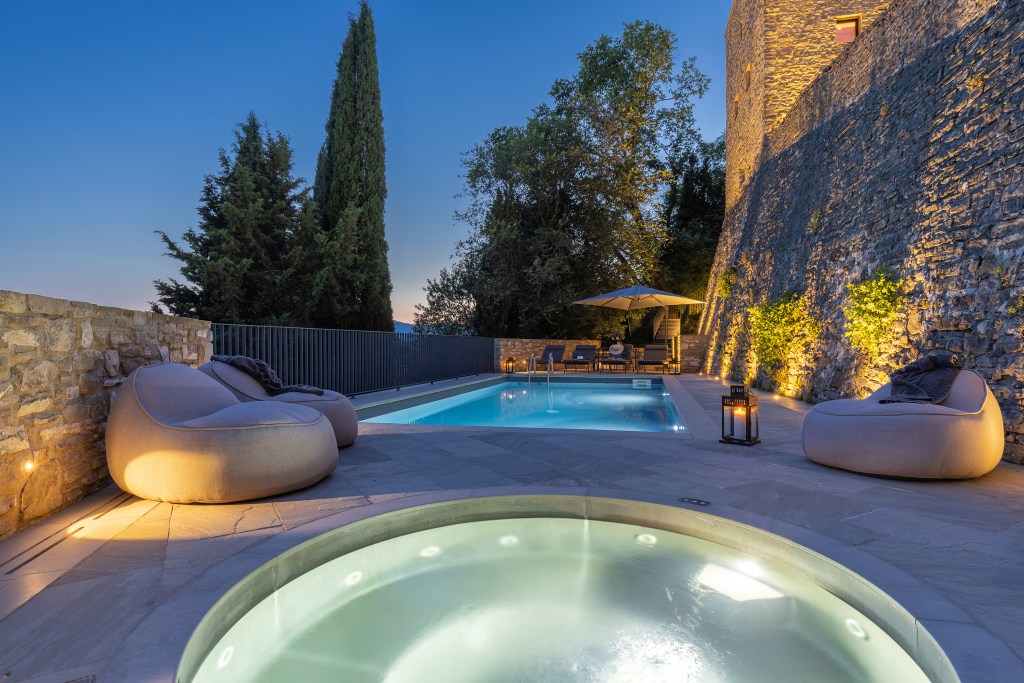 pool and spa lounge area in Tuscany