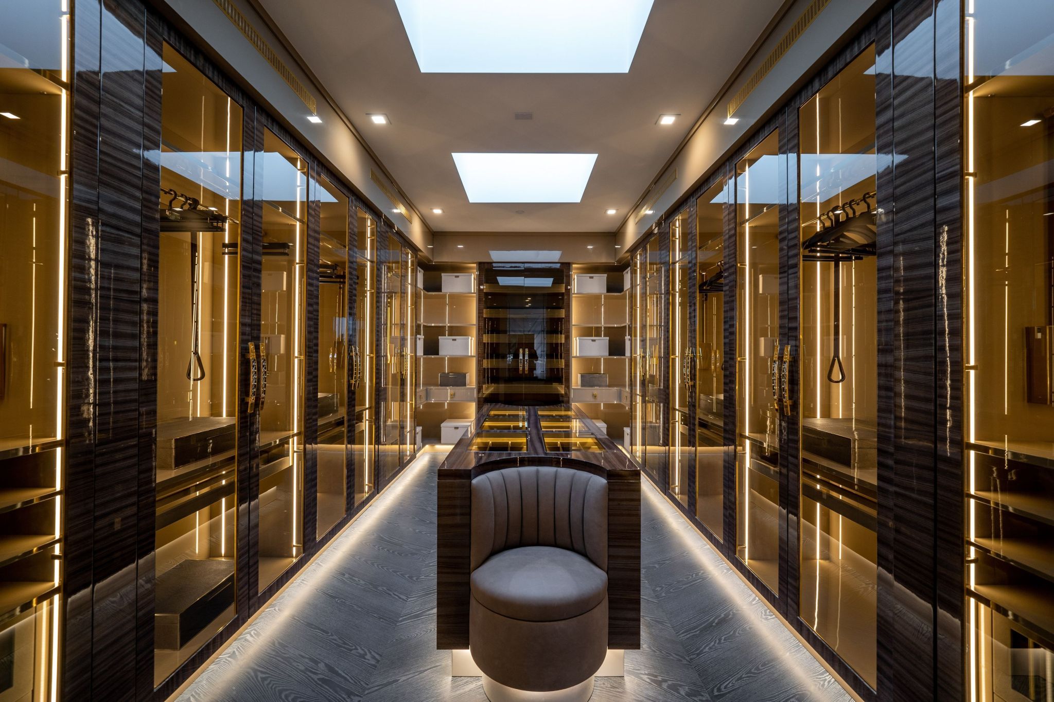 Bel Air dressing room with glass doors and recessed lighting