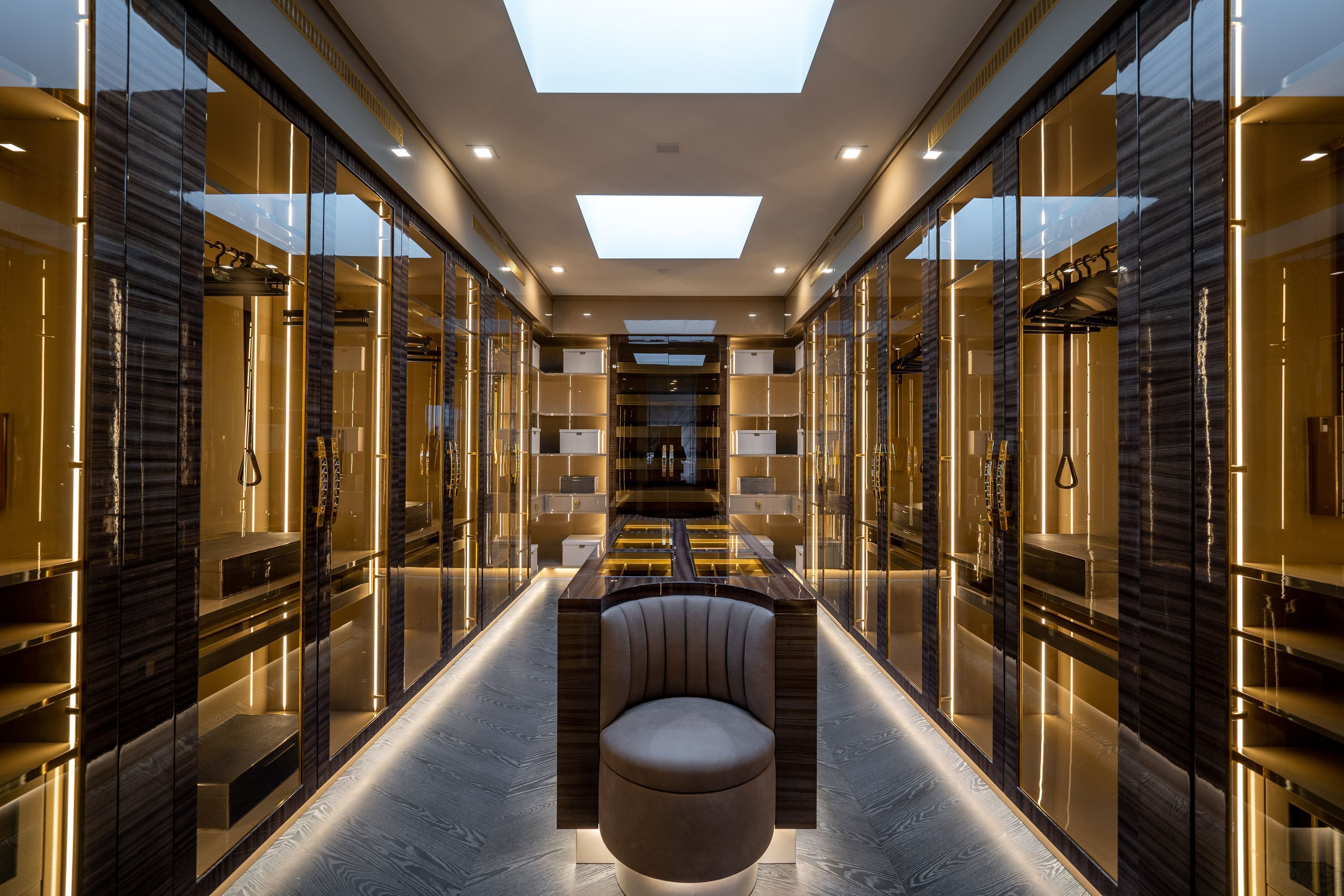Bel Air dressing room with glass doors and recessed lighting