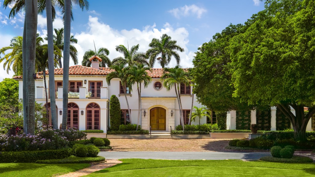 Facade of a Mediterranean-style home in Palm Beach Florida