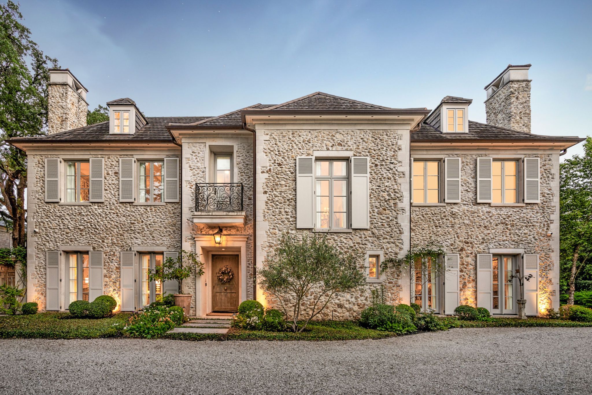exterior of French-inspired stone estate in Texas
