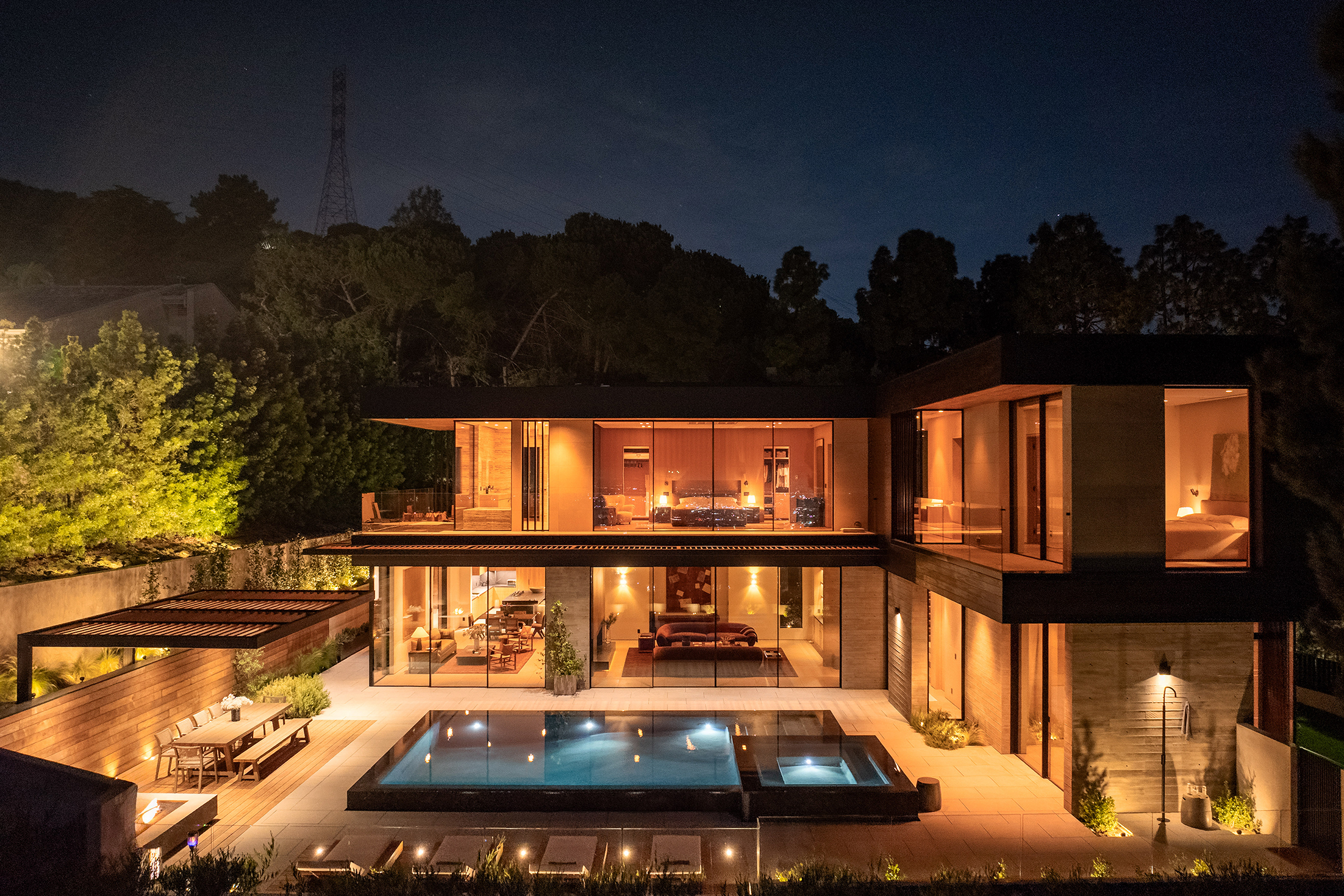 exterior of well-lit contemporary home in Los Angeles, at night