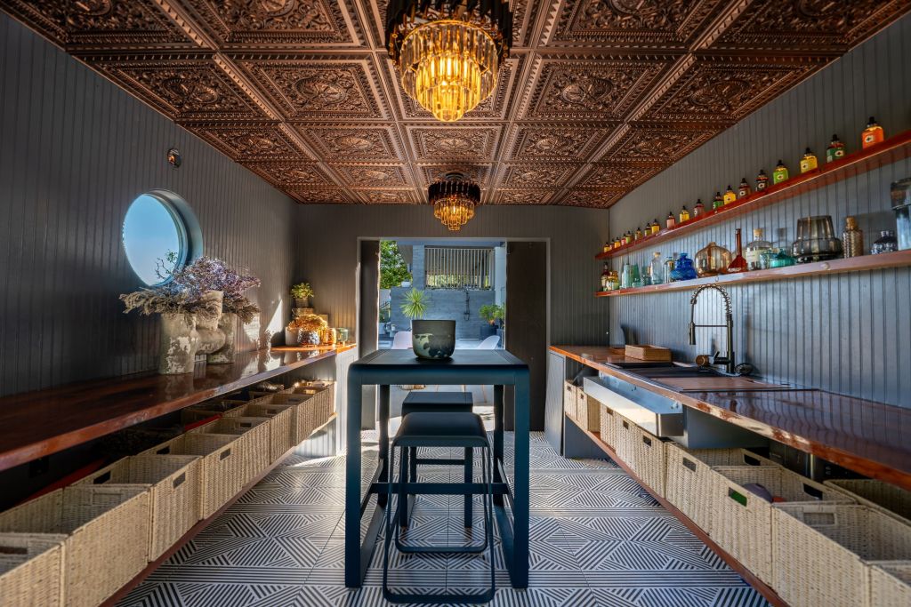 potting shed with ornate copper ceilings and wood counters