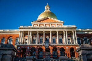 photo of Massachusetts State House, with columns and gold dome
