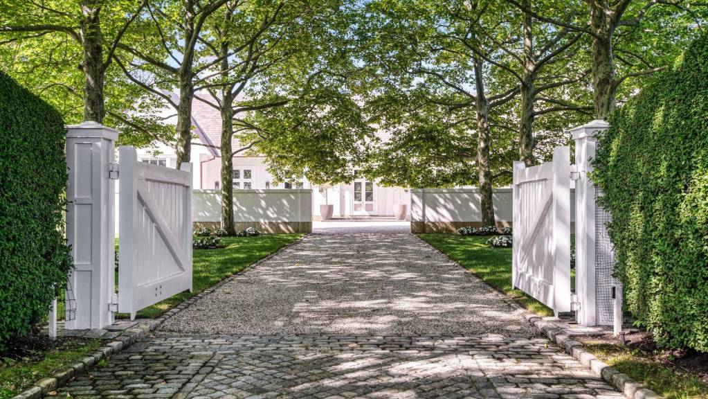 exterior gate of Hamptons home in the Fordune Estate community