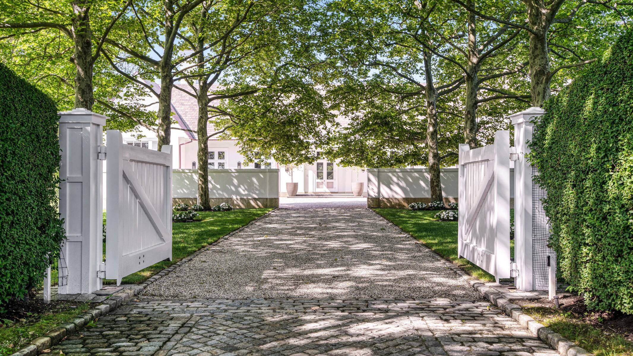exterior gate of Hamptons home in the Fordune Estate community