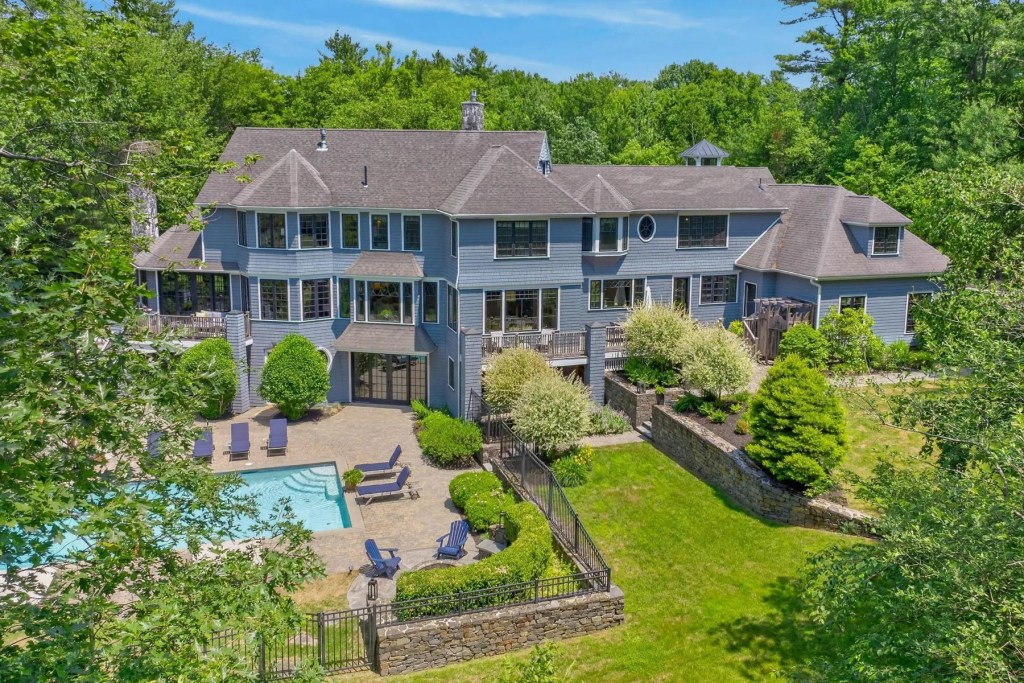 Navy blue shingle style home exterior in Maine