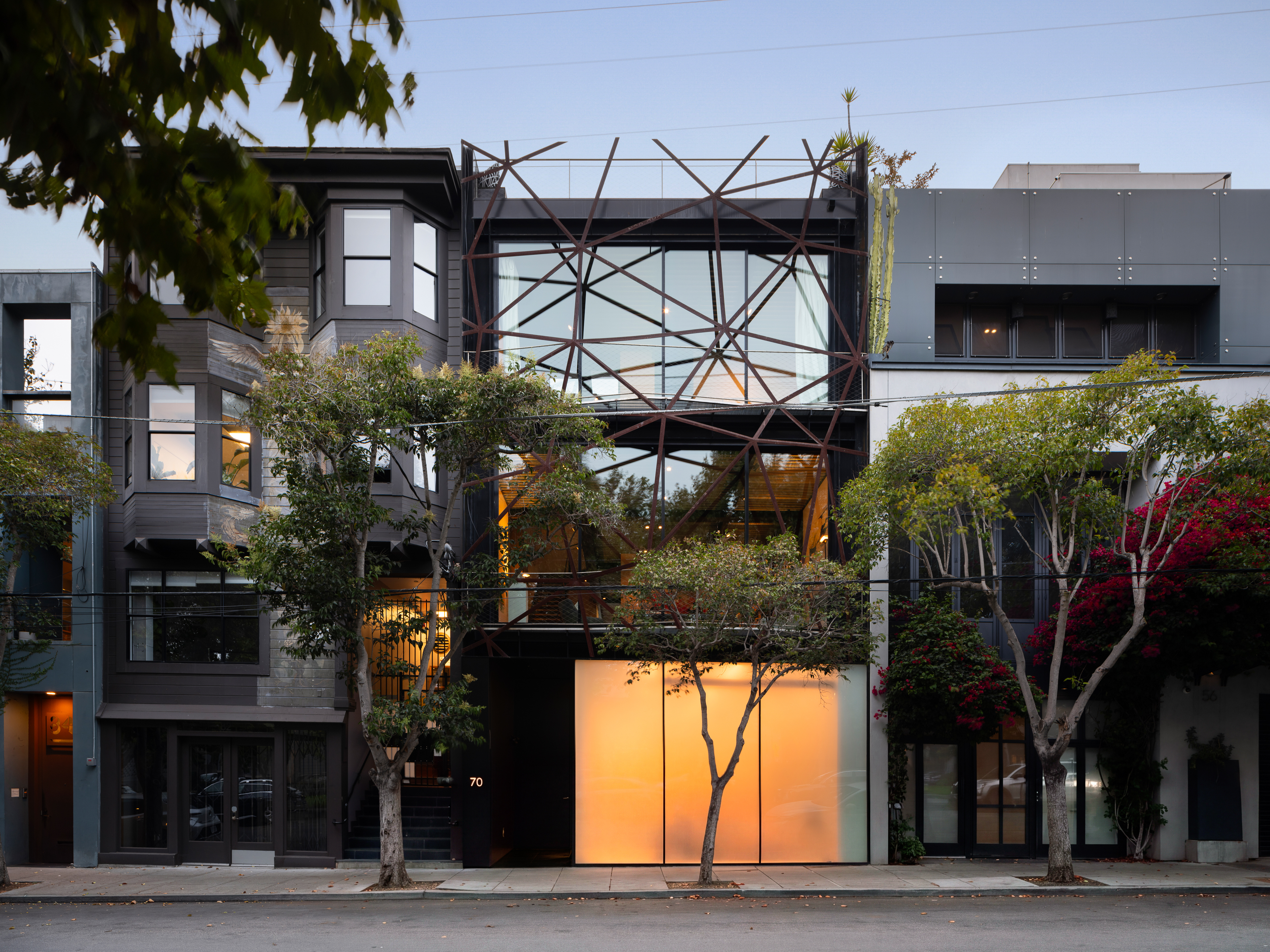 Exterior of San Francisco's Gallery House, with artistic steel webbing and large windows
