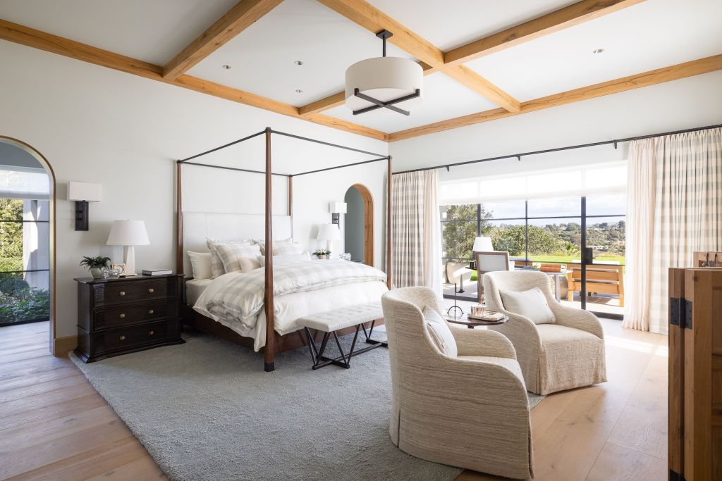 airy primary suite in Rancho Santa Fe home with walk-out porch