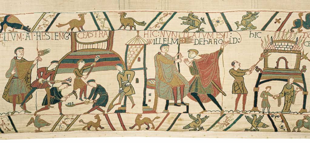 The Bayeux tapestry depicting scenes from the events leading up to the Battle of Hastings, featuring multiple figures and animals